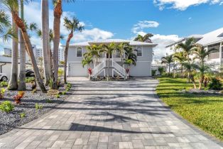 Single Family Residence, 7842 Buccaneer Laguna Shores, FL 33931 
