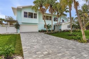 Single Family Residence, 1543 San Carlos Bay Sanibel Isles, FL 33957 