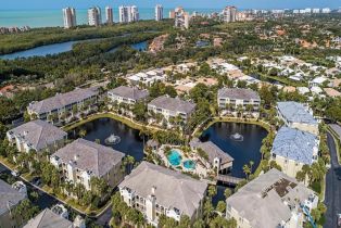 , 7670 Pebble Creek Cir # 202, Naples FL 34108