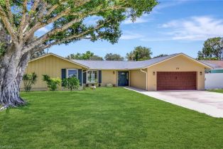 , 124 FLame Vine Dr, Naples FL 34110
