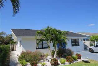 Triplex, 717 95th Ave N # 1, Naples FL 34108