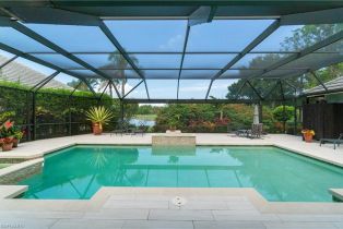 Single Family Residence, 15311 Burnaby Barefoot Beach, FL 34110 