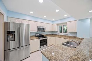 Low Rise (1-3), 1608 Spoonbill Ln # B, Naples FL 34105