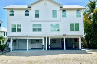 Single Family Residence, 16671 Seagull Bay Bokeelia, FL 33922 