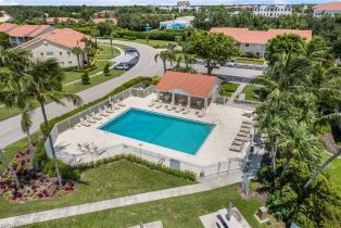 Low Rise (1-3), 7754 Emerald Cir # T202, Naples FL 34109