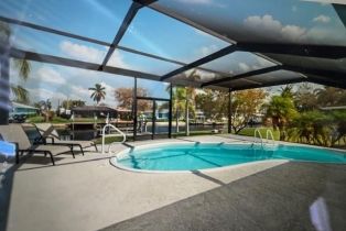 Single Family Residence, 6128 Cocos Island Park, FL 33908 