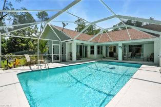 Single Family Residence, 5891 Golden Oaks Ln, Naples FL 34119