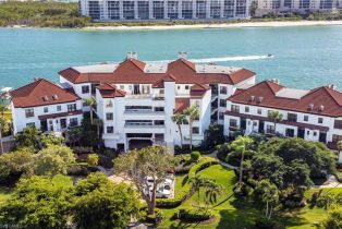 Mid Rise (4-7), 305 La Peninsula Blvd # 305, Naples FL 34113