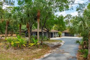 Single Family Residence, 6940 Bottlebrush Livingston Woods, FL 34109 