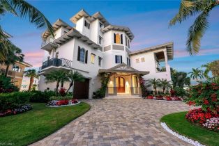 Single Family Residence, 103 Guadeloupe Barefoot Beach, FL 34134 