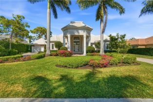 Single Family Residence, 771 Brentwood Barefoot Beach, FL 34110 