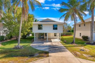 Single Family Residence, 1284 Rainbow Barefoot Beach, FL 34110 