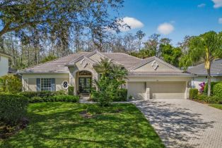 Single Family Residence, 5875 Whisperwood The Strand, FL 34110 