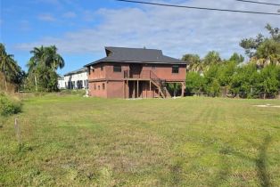 Single Family Residence, 16540 Wisteria Cottage Point Unrec, FL 33908 