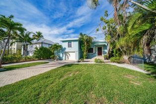 Single Family Residence, 1283 Grand Canal Barefoot Beach, FL 34110 